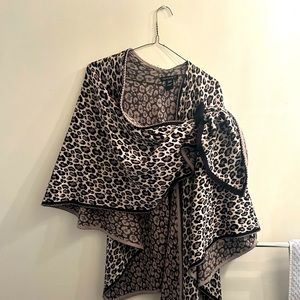 Samuel and Co leopard print shawl. Very warm and stylish. You can hold in place.